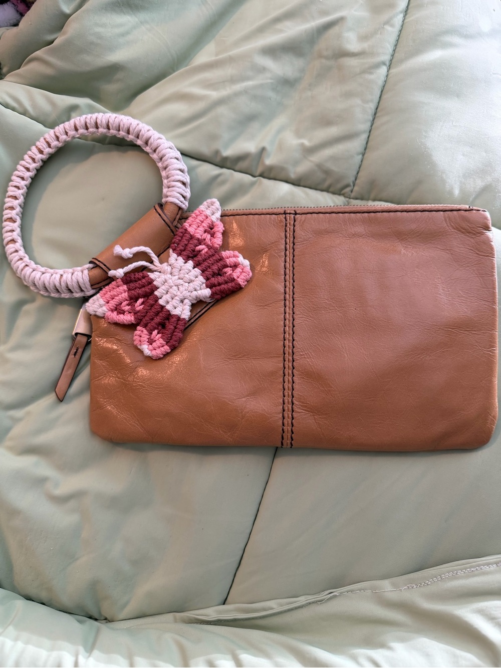HOBO Tan Leather Wristlet with Pink Crochet Butterfly Charm